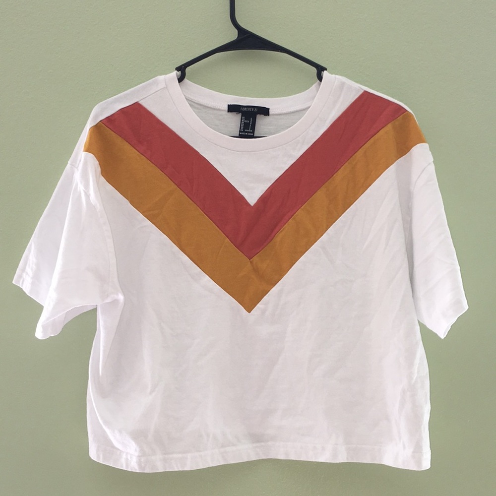 White crop top with orange design